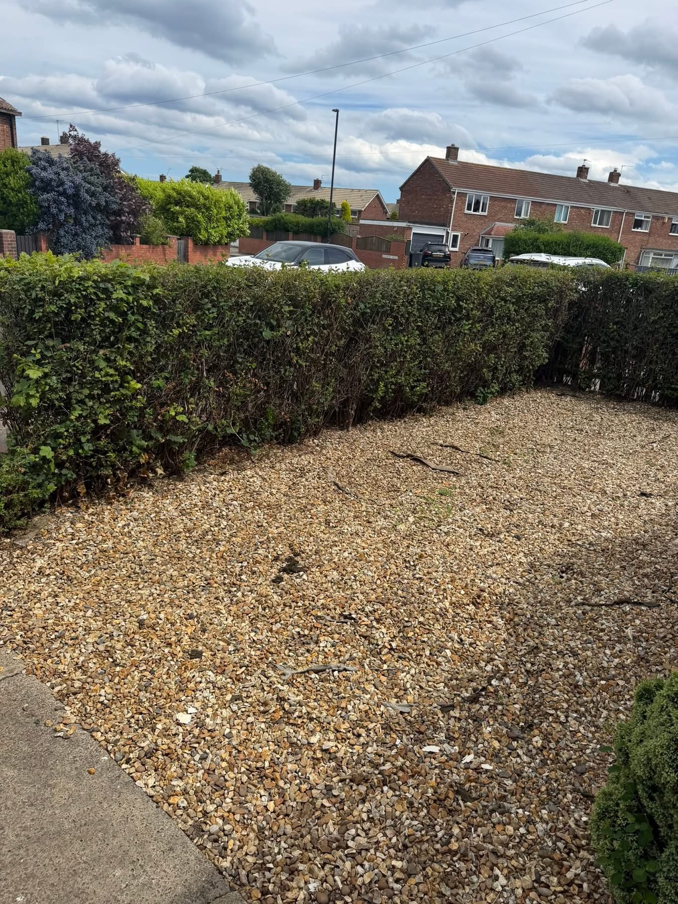 Clear gravel garden after waste removal in Whitley Bay